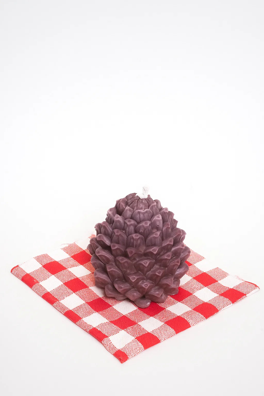 Pine cone candle